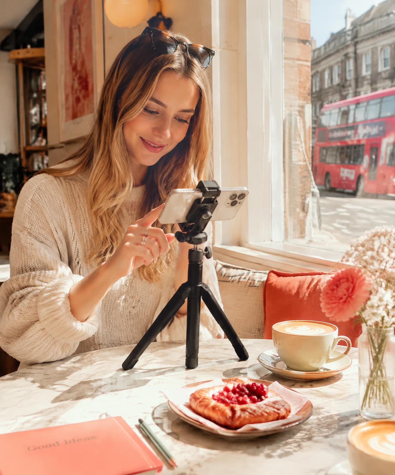 A creator filming content in a London café